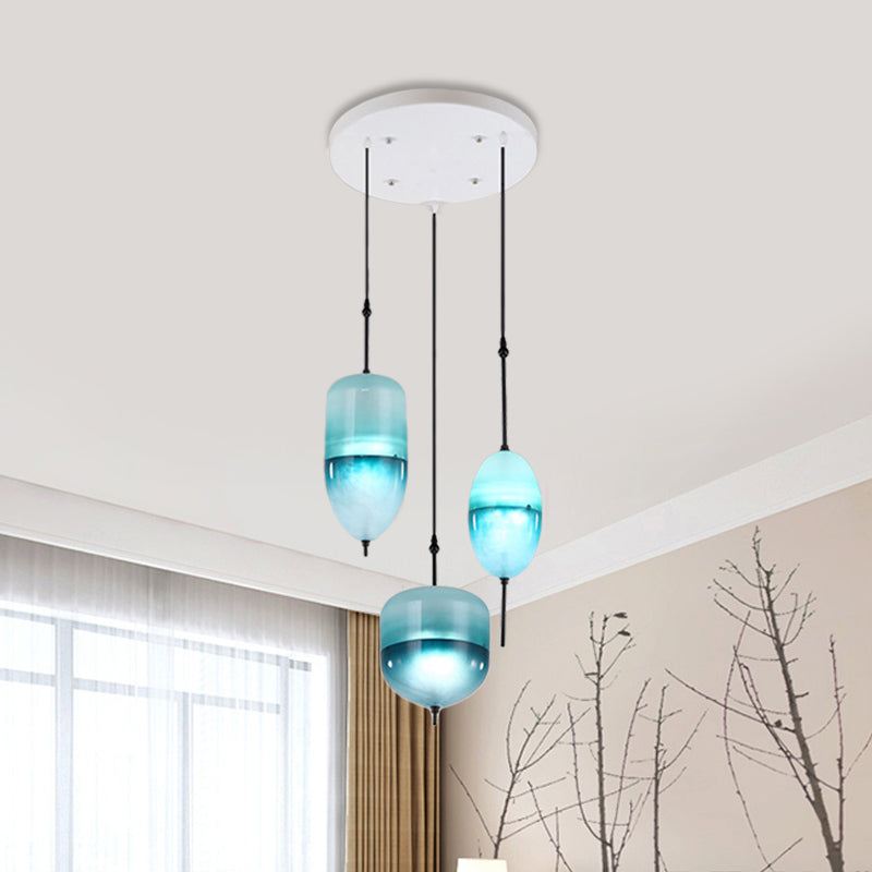 Modernist Teardrop Cluster Pendant Glass 3 Lights Living Room Hanging Light Fixture in Blue Clearhalo 'Ceiling Lights' 'Glass shade' 'Glass' 'Modern Pendants' 'Modern' 'Pendant Lights' 'Pendants' Lighting' 600114