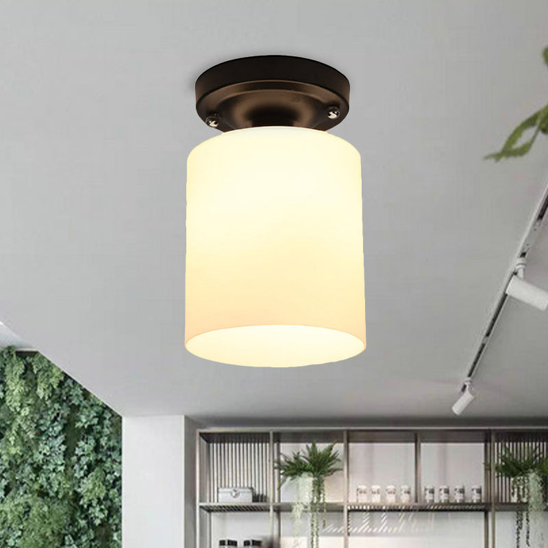 Black One Light Ceiling Mount Industrial Milky Glass Cylinder Semi Flush Light for Corridor Clearhalo 'Ceiling Lights' 'Close To Ceiling Lights' 'Close to ceiling' 'Glass shade' 'Glass' 'Island Lights' 'Semi-flushmount' Lighting' 605818