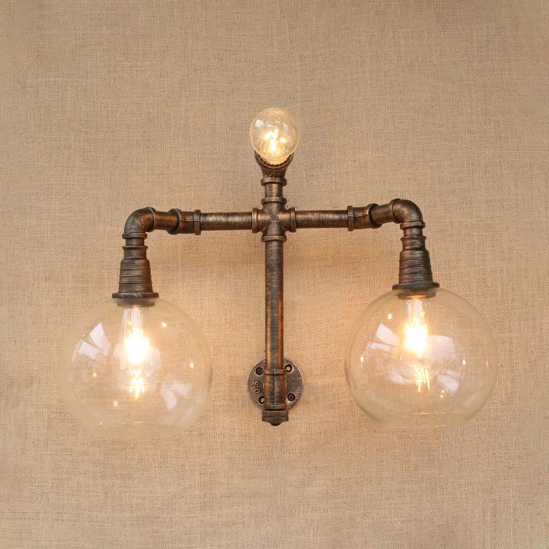 Glass Clear Wall Mounted Light Global Shade 2/3 Lights Vintage Style Wall Sconce Lighting with Pipe for Living Room Clearhalo 'Cast Iron' 'Glass' 'Industrial wall lights' 'Industrial' 'Middle century wall lights' 'Modern' 'Tiffany' 'Traditional wall lights' 'Wall Lamps & Sconces' 'Wall Lights' Lighting' 616173
