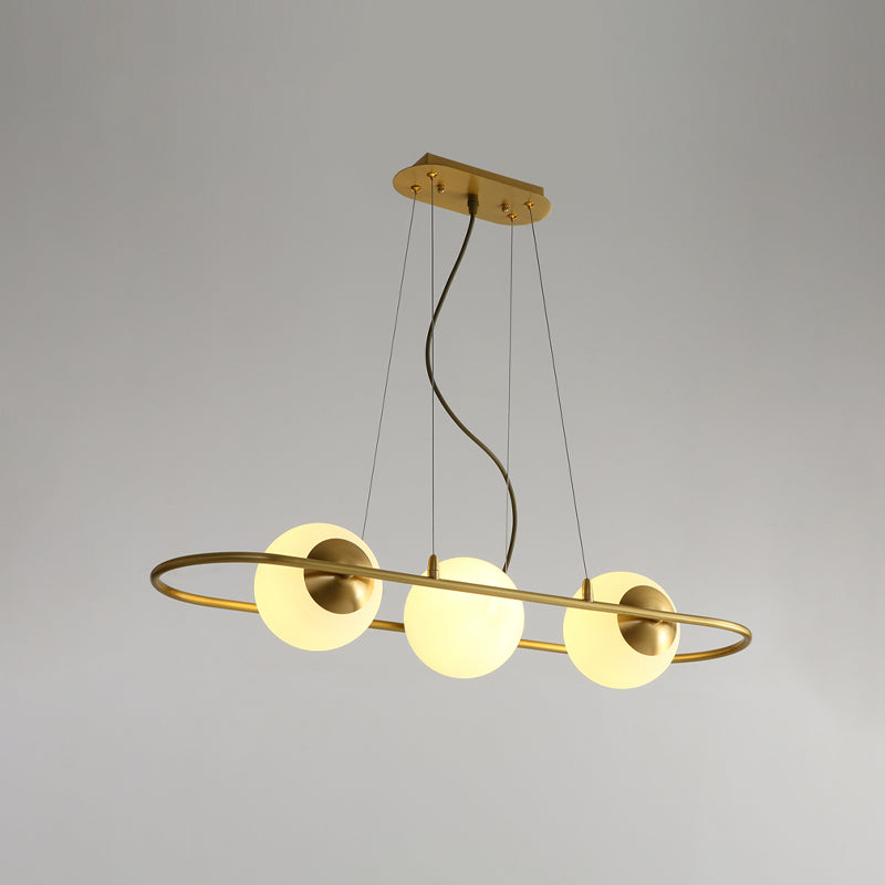 Sphere Dining Room Chandelier Frosted Glass 3-Light Post Modern Hanging Ceiling Lamp with Brass Oval Ring Beam Clearhalo 'Ceiling Lights' 'Chandeliers' 'Modern Chandeliers' 'Modern' Lighting' 735340