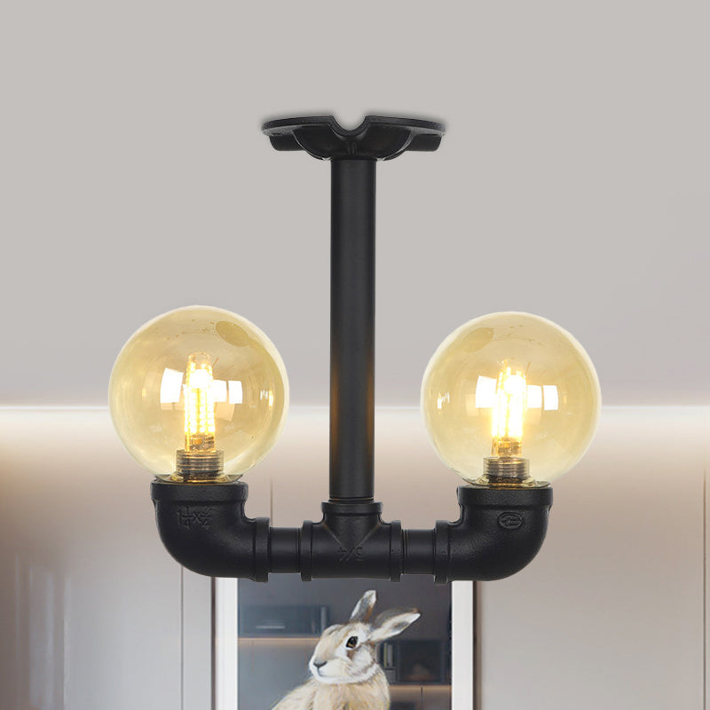 2-Head Semi-Flush Ceiling Fixture Industrial Ball Amber Glass Flush Mount Lighting in Black Black A Clearhalo 'Ceiling Lights' 'Close To Ceiling Lights' 'Close to ceiling' 'Glass shade' 'Glass' 'Semi-flushmount' Lighting' 756686