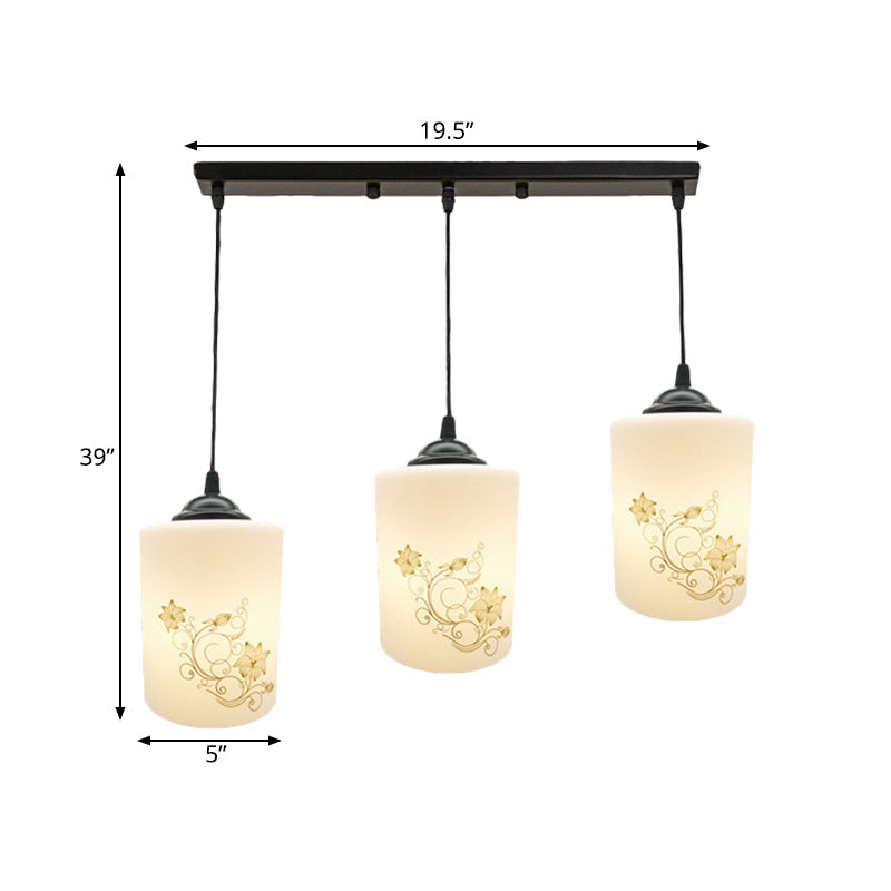 Cylinder Dining Room Multi Ceiling Light Modern White Printed Glass 3-Head Black Hanging Pendant with Linear/Round Canopy Clearhalo 'Ceiling Lights' 'Glass shade' 'Glass' 'Pendant Lights' 'Pendants' Lighting' 802017
