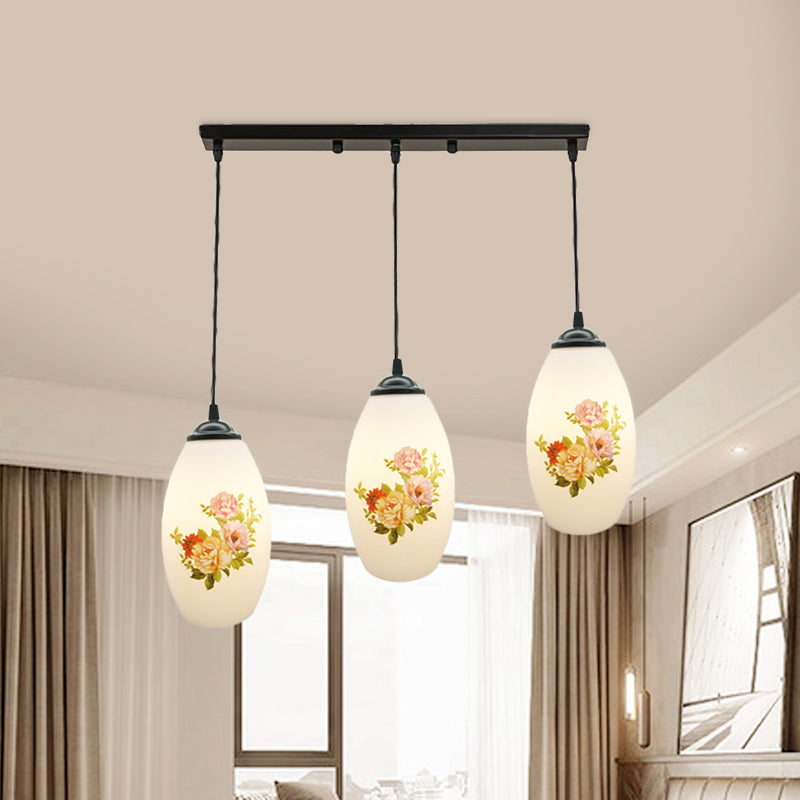 Minimalism Oval Multi Lamp Pendant 3 Heads White Frosted Glass Suspension Light in Black with Linear/Round Canopy Clearhalo 'Ceiling Lights' 'Glass shade' 'Glass' 'Pendant Lights' 'Pendants' Lighting' 802114