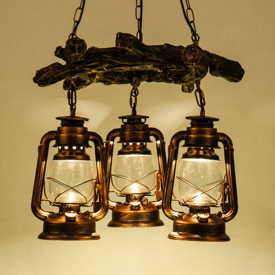 Kerosene Clear Glass Chandelier Lighting Coastal 3-Light Dining Room Pendant Lighting in Bronze/Copper Clearhalo 'Cast Iron' 'Ceiling Lights' 'Chandeliers' 'Industrial Chandeliers' 'Industrial' 'Metal' 'Middle Century Chandeliers' 'Rustic Chandeliers' 'Tiffany' Lighting' 84939