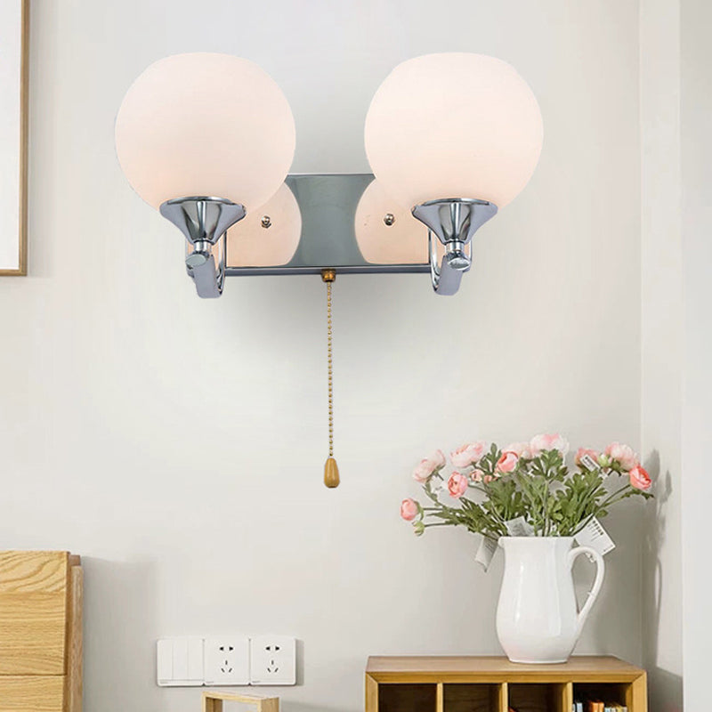 Cream Glass Global Wall Mount Light Modern 2-Head Chrome Wall Lamp Fixture with Pull Chain Clearhalo 'Cast Iron' 'Glass' 'Industrial' 'Modern wall lights' 'Modern' 'Tiffany' 'Traditional wall lights' 'Wall Lamps & Sconces' 'Wall Lights' Lighting' 875305