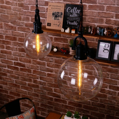 1 Light Hanging Ceiling Light Orb Clear Glass Modern Dining Room Pendant Lighting in Black Clearhalo 'Ceiling Lights' 'Glass shade' 'Glass' 'Industrial Pendants' 'Industrial' 'Middle Century Pendants' 'Pendant Lights' 'Pendants' 'Tiffany' Lighting' 95881